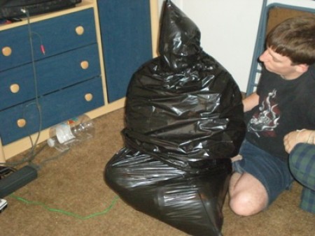 Taking Out The Trash - Bagger found one thing gasper loves to do: trash bagging. She loves the tight warmful feeling and loves the complete utter lack of control. So bagger using two trash bags, bags gasper. The bag looks wonderful sucked to her face and she gasps loud and proud. The smile she gives at the end of the update is worth a million.